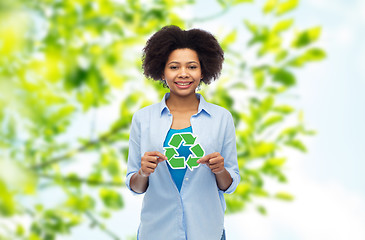 Image showing happy afro american woman over natural background