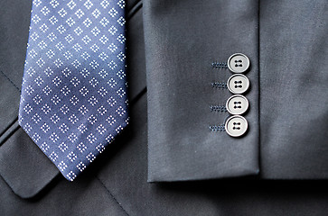 Image showing close up of business suit jacket and tie