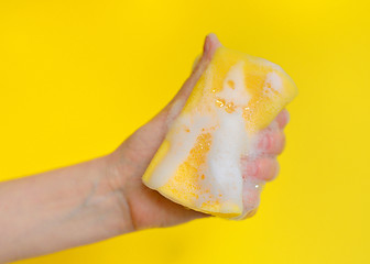 Image showing Hand with sponge with foam 