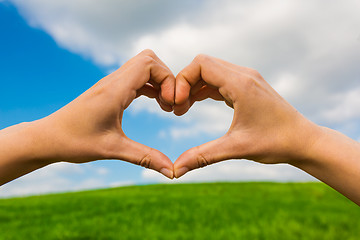 Image showing Hands making a heart shape