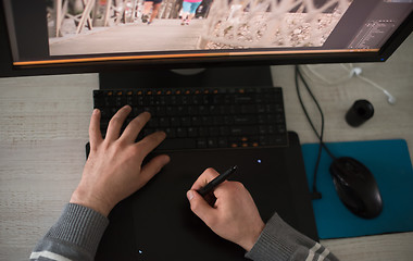 Image showing graphic designer at work top view