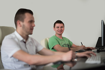 Image showing a group of graphic designers at work