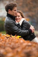 Image showing Autumn portrait of attractive happy couple