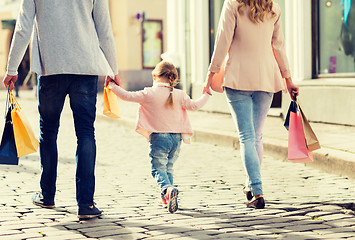 Image showing close up of family with child shopping in city