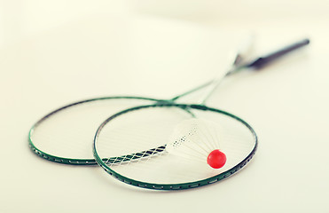 Image showing close up of badminton rackets with shuttlecock