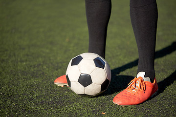 Image showing soccer player playing with ball on football field