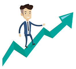Image showing Happy businessman standing on profit chart.