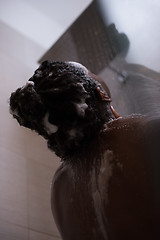 Image showing African American woman in the shower