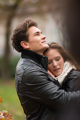 Image showing Autumn portrait of attractive happy couple