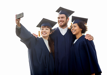 Image showing students or bachelors taking selfie by smartphone