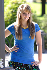 Image showing Teenage Girl Peaking around the corner