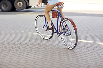 Image showing hipster man riding fixed gear bike