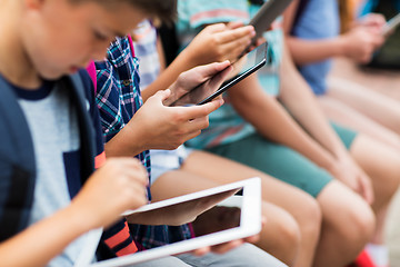 Image showing close up of elementary students with tablet pc