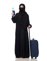 Image showing muslim woman with ticket, passport and travel bag