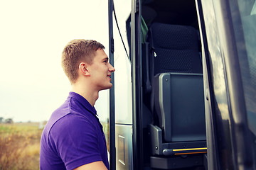 Image showing group of happy male passenger boarding travel bus