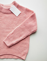 Image showing close up of sweater or pullover with price tag