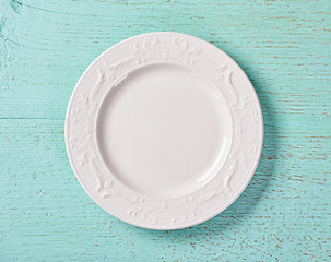 Image showing white plate on blue background