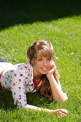 Image showing Pretty Teen Girl Lying in Grass