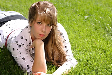 Image showing Serious Teenage Girl in the Grass