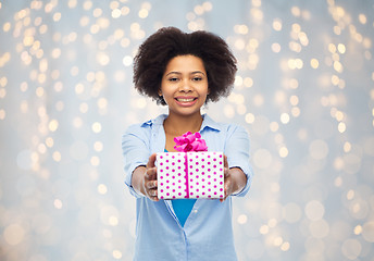 Image showing happy african woman with birthday gift box