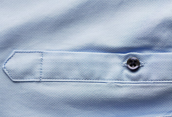 Image showing close up of blue shirt sleeve