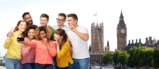 Image showing people taking selfie by smartphone in london