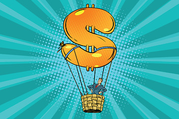 Image showing businessman in a hot air balloon dollar