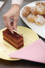 Image showing Woman confectioner preparing cake