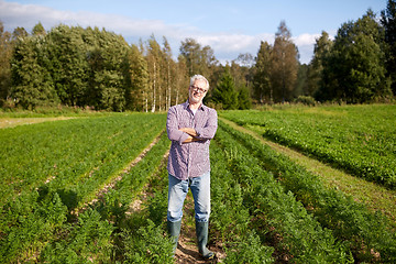 Image showing happy senior man at farm