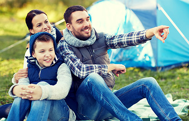 Image showing happy family with tent at camp site