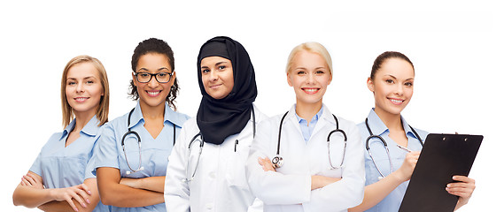 Image showing group of female doctors with clipboard