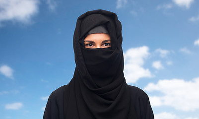 Image showing muslim woman in hijab over white background