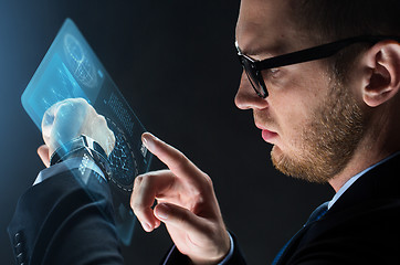 Image showing close up of businessman with smart watch