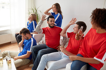 Image showing friends or football fans watching soccer at home