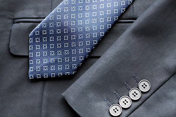 Image showing close up of business suit jacket and tie