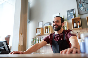Image showing happy man or waiter at bar or coffee shop