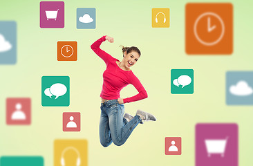 Image showing smiling young woman jumping in air with menu icons