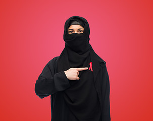 Image showing muslim woman in hijab with red awareness ribbon