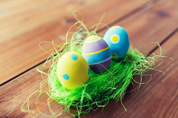 Image showing close up of colored easter eggs and grass