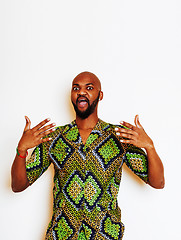 Image showing portrait of young handsome african man wearing bright green nati