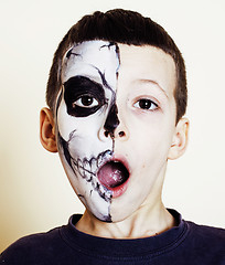 Image showing little cute boy with facepaint like skeleton to celebrate hallow