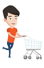 Image showing Male customer running into the shop with trolley.