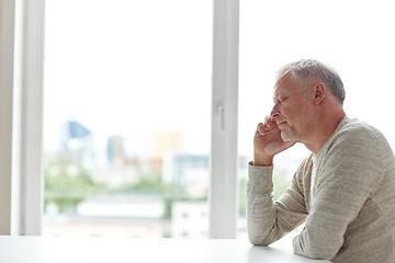 Image showing close up of senior man thinking