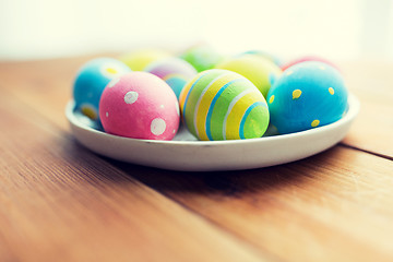 Image showing close up of colored easter eggs on plate