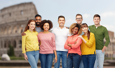 Image showing international group of happy people over coliseum