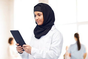 Image showing muslim female doctor in hijab with tablet pc