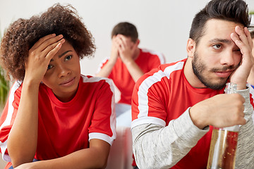 Image showing sad friends or football fans at home