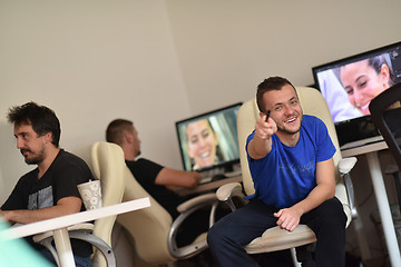 Image showing a group of graphic designers at work