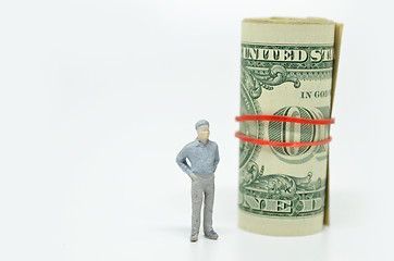 Image showing Figure of businessman and one dollar bill