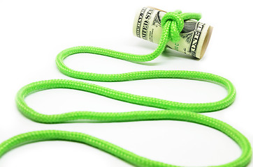 Image showing Roll of hundred dollar bills related rope in knot 